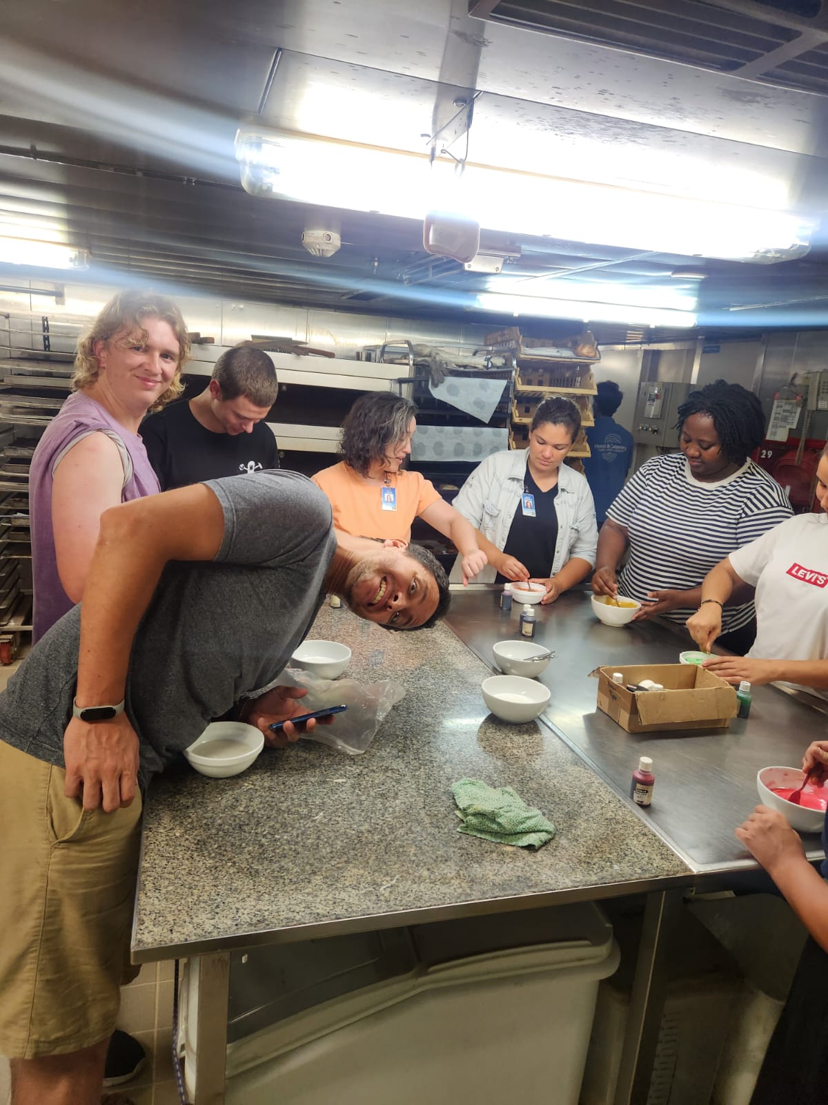 They're all mixing the colors to coat the bread