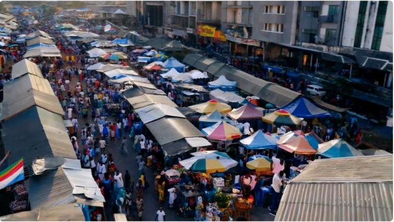 Prompt: A beautiful homemade video showing the people of Lagos, Nigeria in the year 2056. Shot with a mobile phone camera.