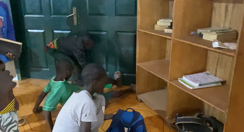 A photo of everyone catching rats together