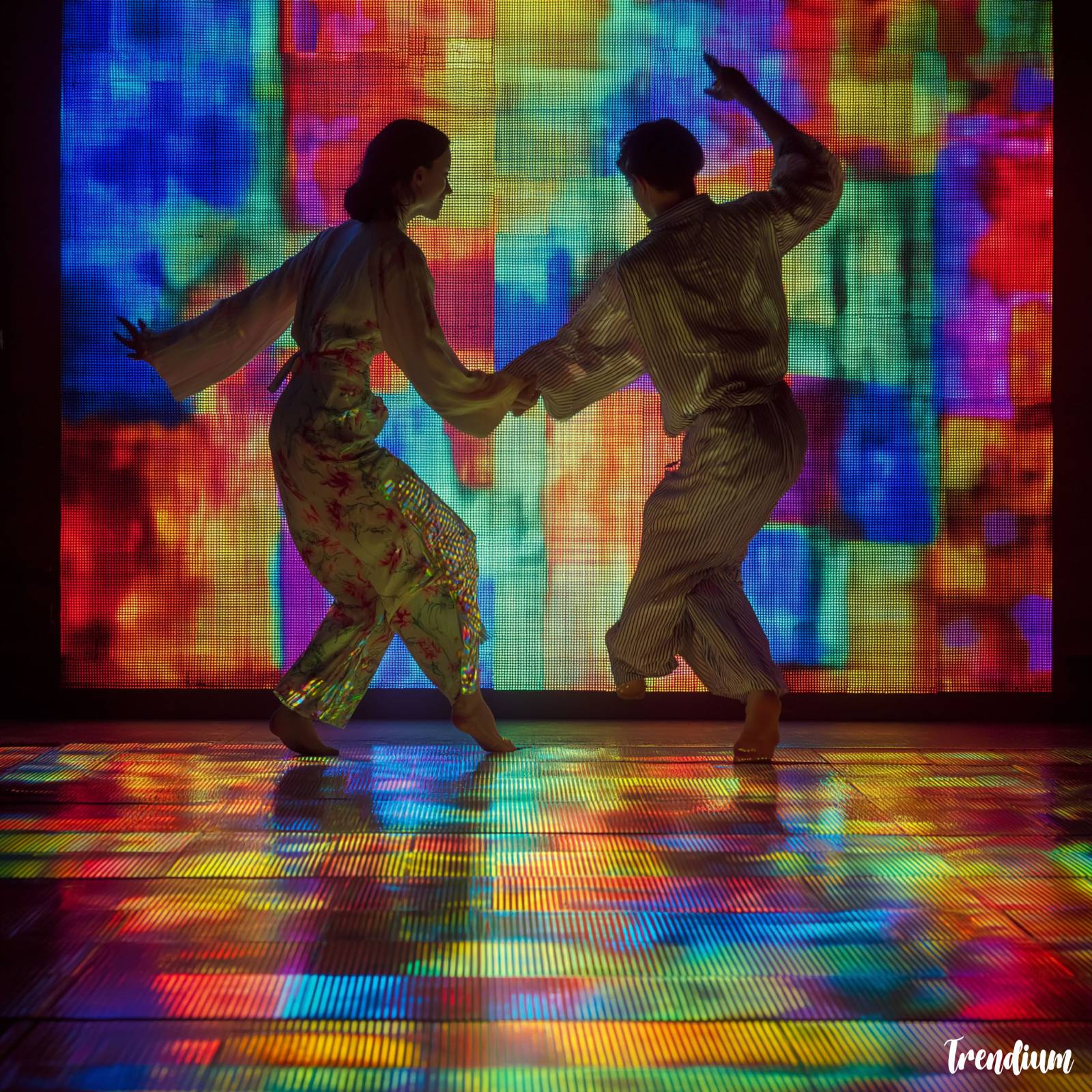 [prompt] Performance stage with dancers interacting with real-time glitch projections, experimental media choreography, Nam June Paik inspired --style raw --v 7 --stylize 200