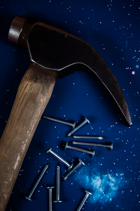 space background, hammer, nails