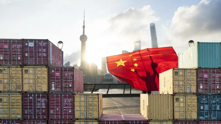 View of Shanghai skyline from a container station.